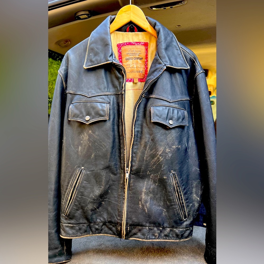 GUESS "MARCIANO COLLECTION"
Black leather motorcycle jacket..